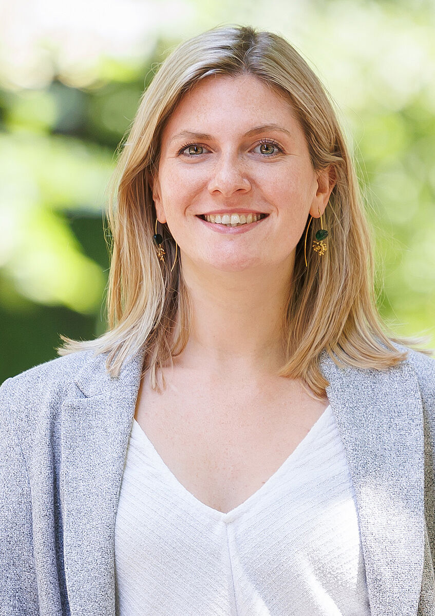 Mag. Angela George